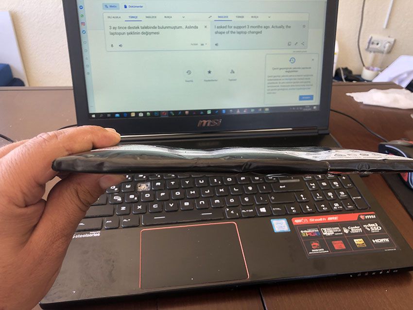 tháo pin laptop phồng